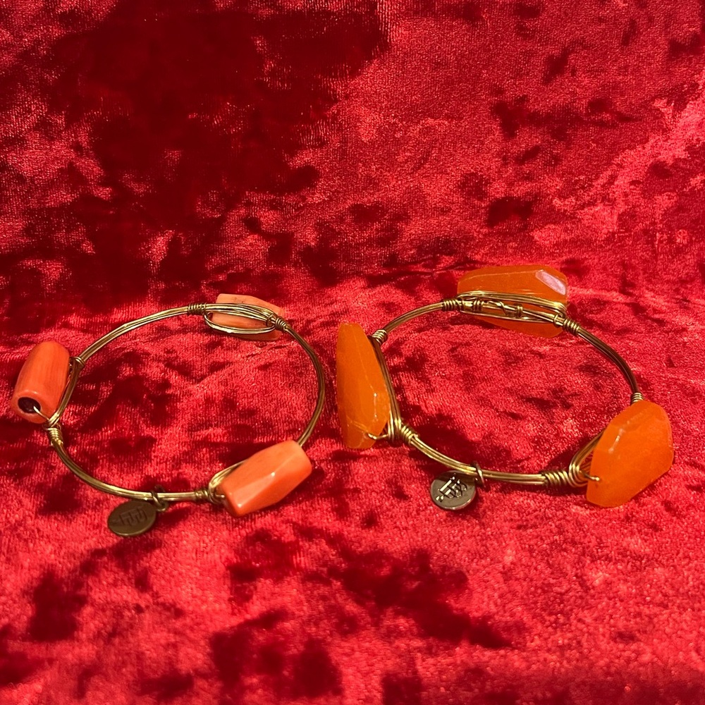 2 orange Bourbon and Bowties gold wire braclets